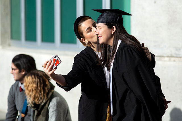 Celebrating with loved ones before Convocation ceremonies on Feb. 21, 2020. (Photo by Tae Hoon Kim)
